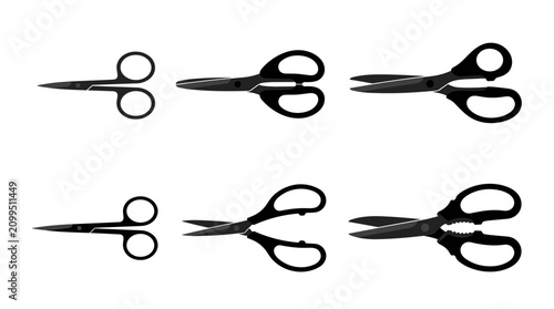 Collection of six different black scissors on a white background