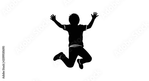 Photos Silhouette of a happy young boy jumping with joy.