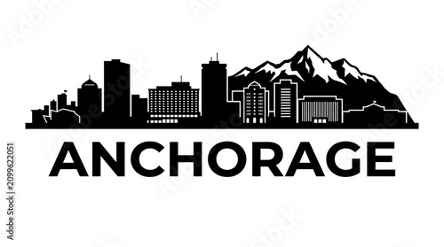 Foto Anchorage city skyline silhouette and mountain range in alaska