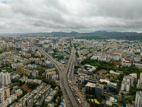 Aerial view of expressway interchange and urban landscape in Pune
