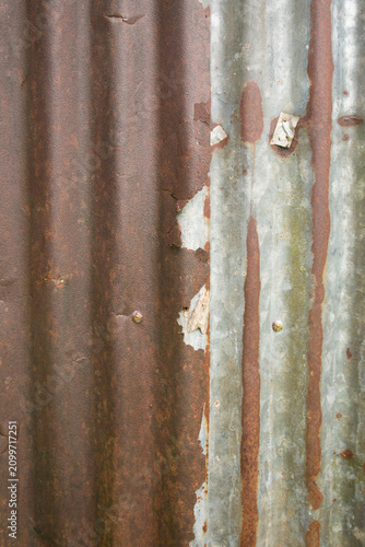 Rusty corrugated iron sheet texture for background and design.