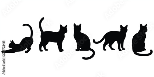 Canvas Print Silhouettes of five domestic cats in various poses, including stretching, sitting, and standing