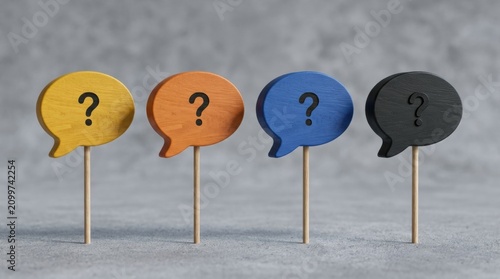 Four colorful wooden speech bubbles with question marks Uses open-ended questions to explore ideas, uncover assumptions