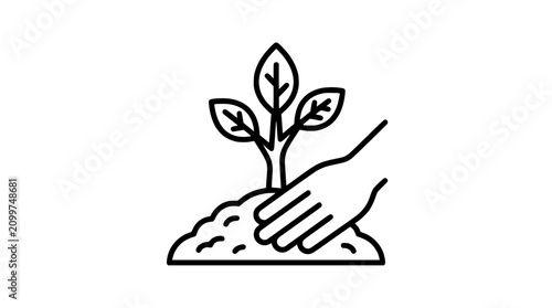 Tableau sur toile Hand planting a small green seedling in fertile soil, concept of growth and new beginnings