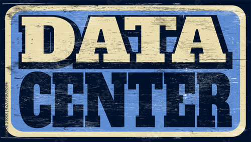 Aged and worn data center sign on wood