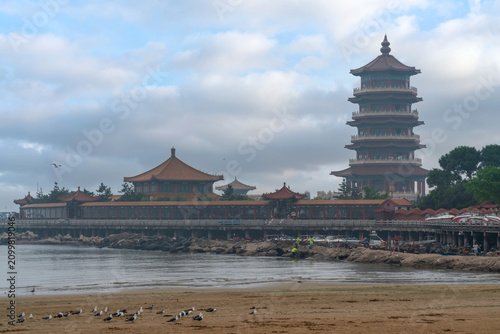 Eight Immortals Crossing the Sea Scenic Area and Huixian Pavilion on the shore of the Yellow Sea on a summer day, Penglai, Yantai, Shandong, China