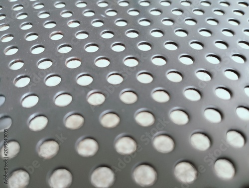 Принти на полотні Perforated Black Metal Sheet Surface Background Texture