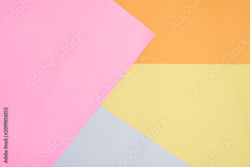 Abstract Background with Colorful Geometric Shapes in Pink, Orange, Yellow, and Grey
