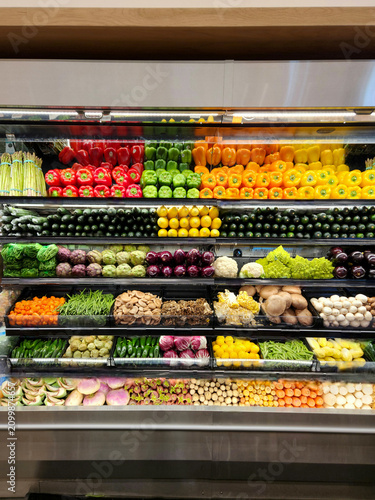 Healthy organic vegetables displayed in a clean supermarket produce department for everyday shopping