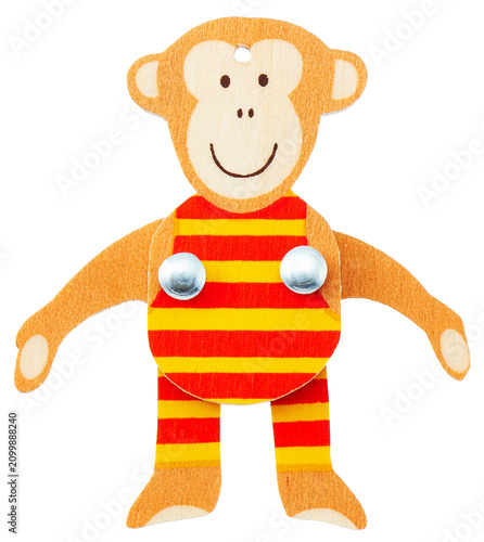Canvas Print Wooden monkey figure wall hook with striped overalls isolated on white backgroun