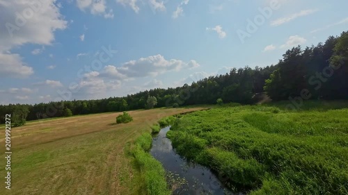 Low FPV Flight Above the Small Grabia River in Central Poland on a Summer Day.