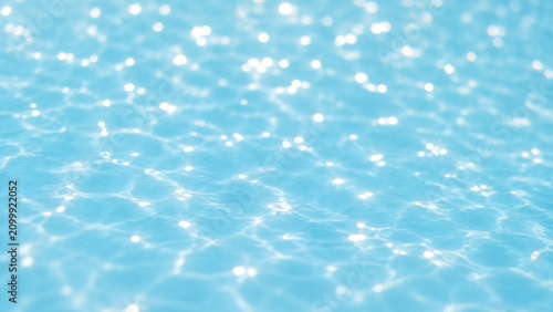 A dreamy pastel blue pool water surface with soft blurred bokeh-like caustic light spots.