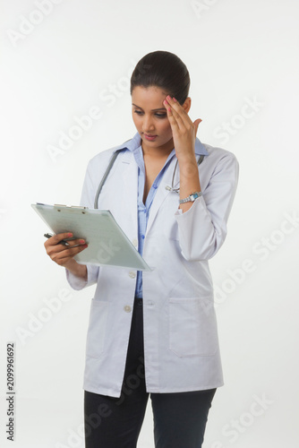 Female doctor thinking