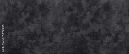 Bilde på lerret Stone texture background featuring a mottled dark gray surface with cloudy blotc