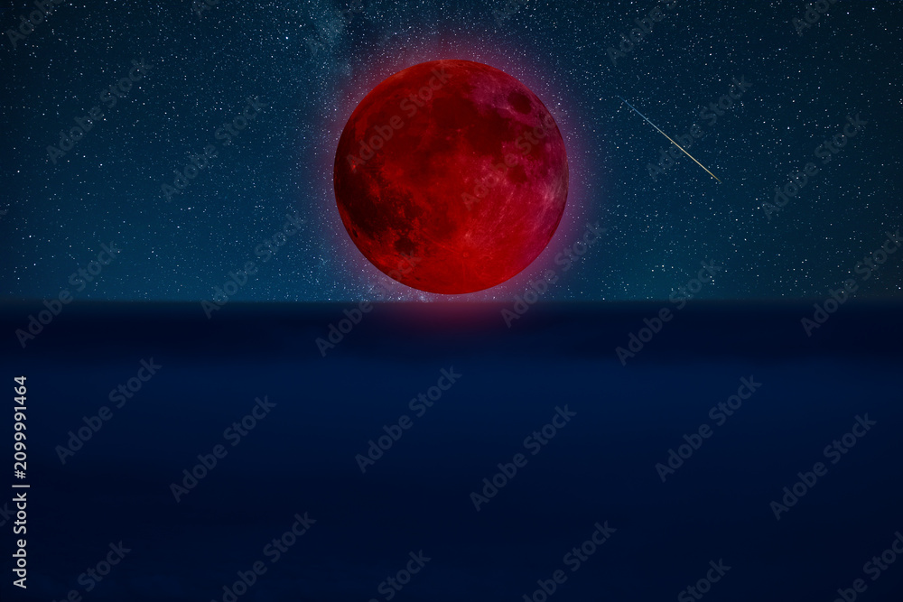 Fototapeta premium Lunar eclipse on a starry Milky Way background.