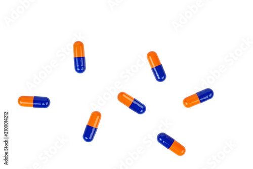 Blue oorange pills isolated on a white background