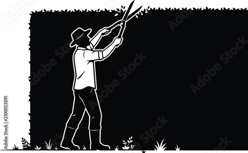 Fotografie Professional gardener trimming large green bush hedge fence wall with manual hed