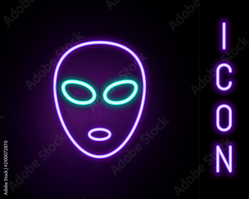 Glowing neon line Alien icon isolated on black background. Extraterrestrial alien face or head symbol. Colorful outline concept. Vector