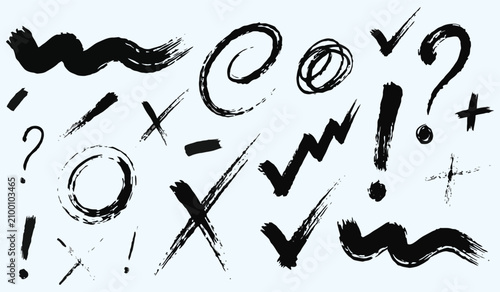 Obraz na plátně Ink brush strokes and symbols in a scattered collection against a pale backgroun