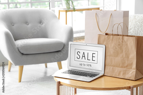 Laptop displaying a sale ad...