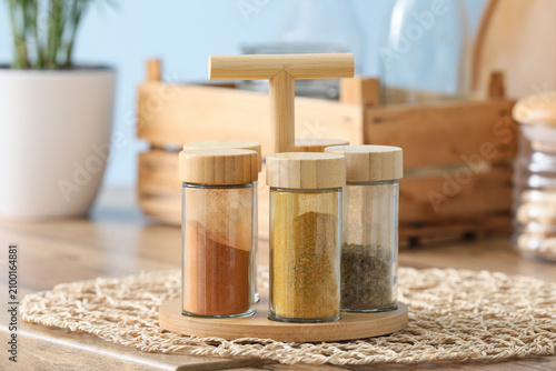 Spice rack with glass jars ...