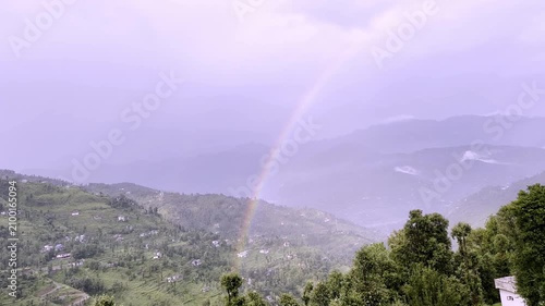 Beautiful Rainbow After Rain Over Scenic Landscape with Colorful Sky, Fresh Atmosphere, Natural Beauty and Peaceful Countryside View Experience