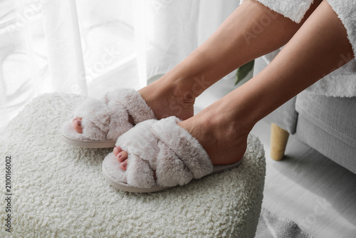 Womans feet in soft fluffy ...