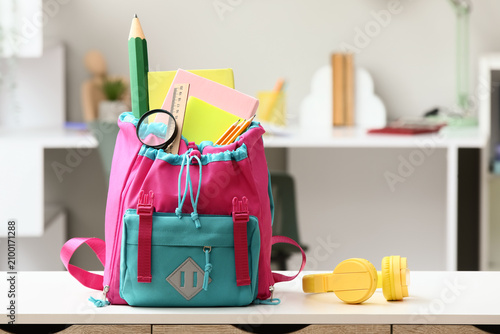Pink and blue school backpa...