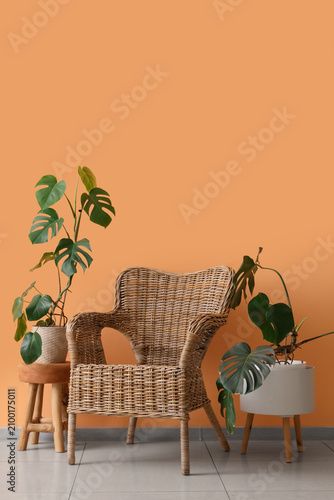 Stylish wicker armchair and...
