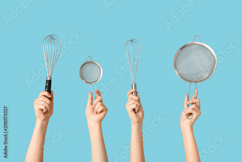 Female hands with sieves an...