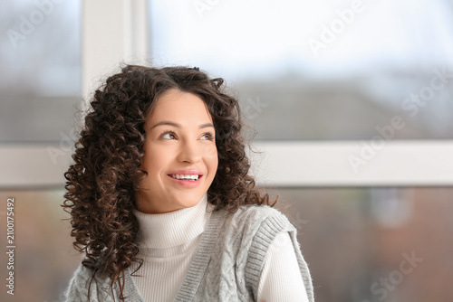 Young businesswoman looking...