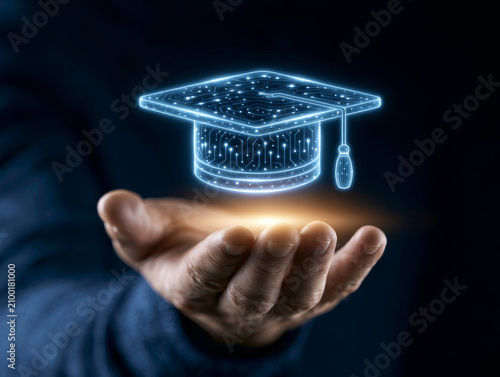 Close-up business's hand, Person holding glowing digital graduation cap symbolizes business training planning learning and coaching concept with futuristic technology and innovation in education