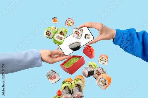 Hands holding a smartphone ...