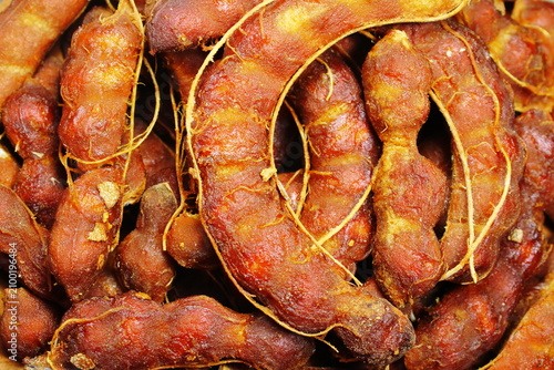 Full Frame Close Up of Fresh Ripe Tamarind Pods Texture Background