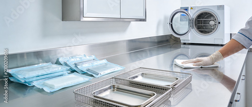Fotografie Sterilization process in a modern clinic with autoclaves and sterile instrument