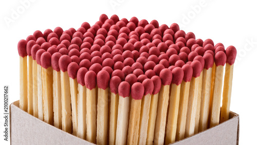 Obraz na plátně Isolated group of new wooden matches with red tips in a cardboard box, ready for