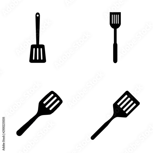 Foto Kitchen spatula turner and cooking flipper solid black silhouette icon set vecto
