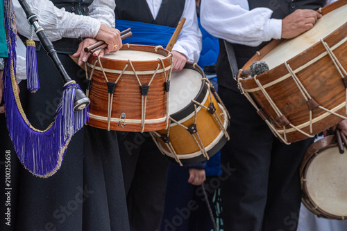 фотографія Traditional galician musicians in folk costumes The Concept of culture