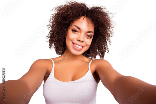 Cuadro en lienzo Self portrait of charming, cheerful, pretty, sweet, cute girl shooting selfie on
