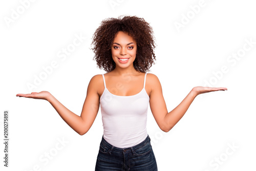 Cuadro en lienzo Portrait of attractive, pretty, charming girl showing copy space, empty place wi