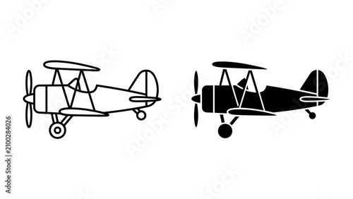Bild auf Leinwand Biplane Icon Set: A graphic representation of a biplane in both outline and silhouette form, showcasing classic aviation design