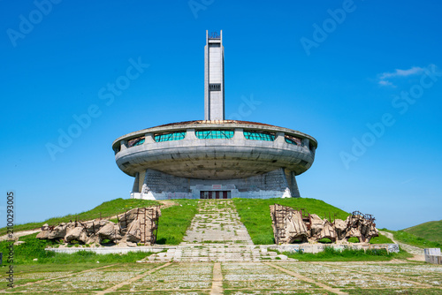 Buzludzha Monument stands as a historic landmark of communist architecture in Bulgaria surrounded by blue sky