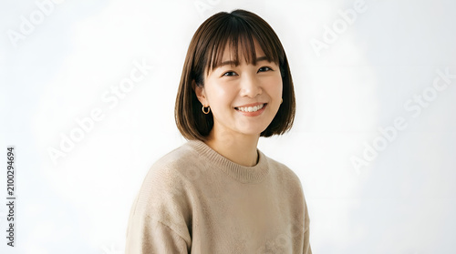 Elegant Beauty Portrait of Smiling Young Woman in Studio