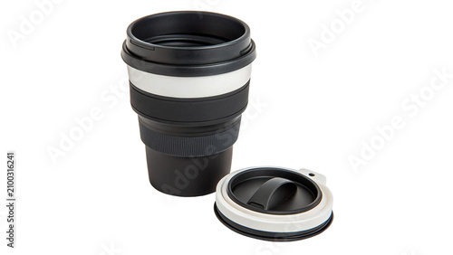 Tableau sur toile Black reusable silicone collapsible travel coffee mug with lid isolated on trans