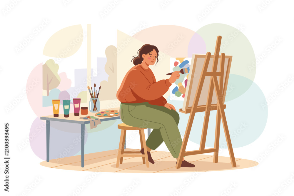 Fototapeta premium Woman artist painting on canvas at easel in studio with art supplies