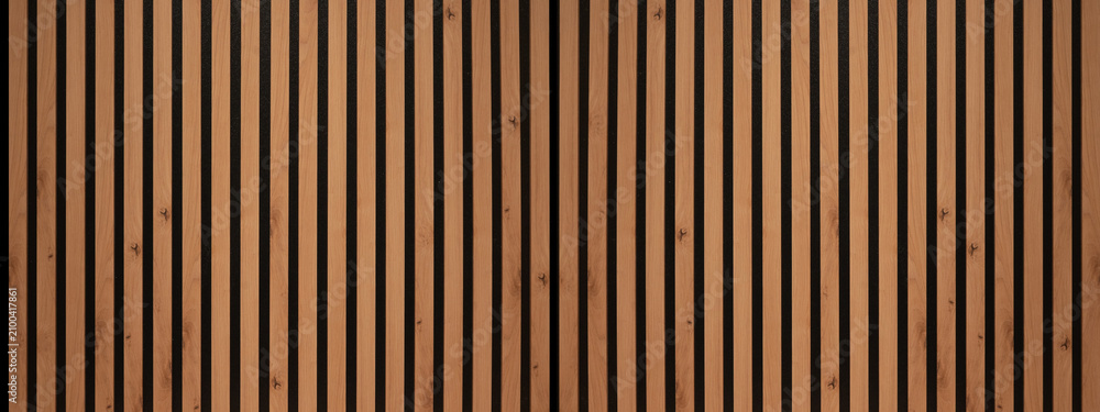 Naklejka premium Wood background banner panorama long - Brown wooden acoustic panels wall texture , seamless pattern, vertical