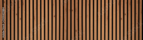 Wood background banner panorama long - Brown wooden acoustic panels wall texture , seamless pattern, vertical