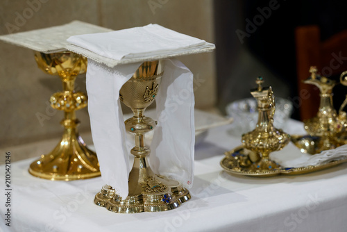 Eucharist celebration elements in Saint Nicolas church during Catholic mass in Meursault, Cote d'Or, France