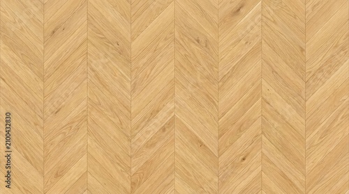 Close-up view of a seamless light oak parquet floor laid in a classic chevron pattern.