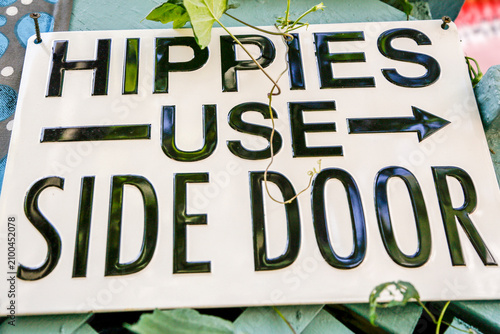 Hippies Use Side Door Sign
